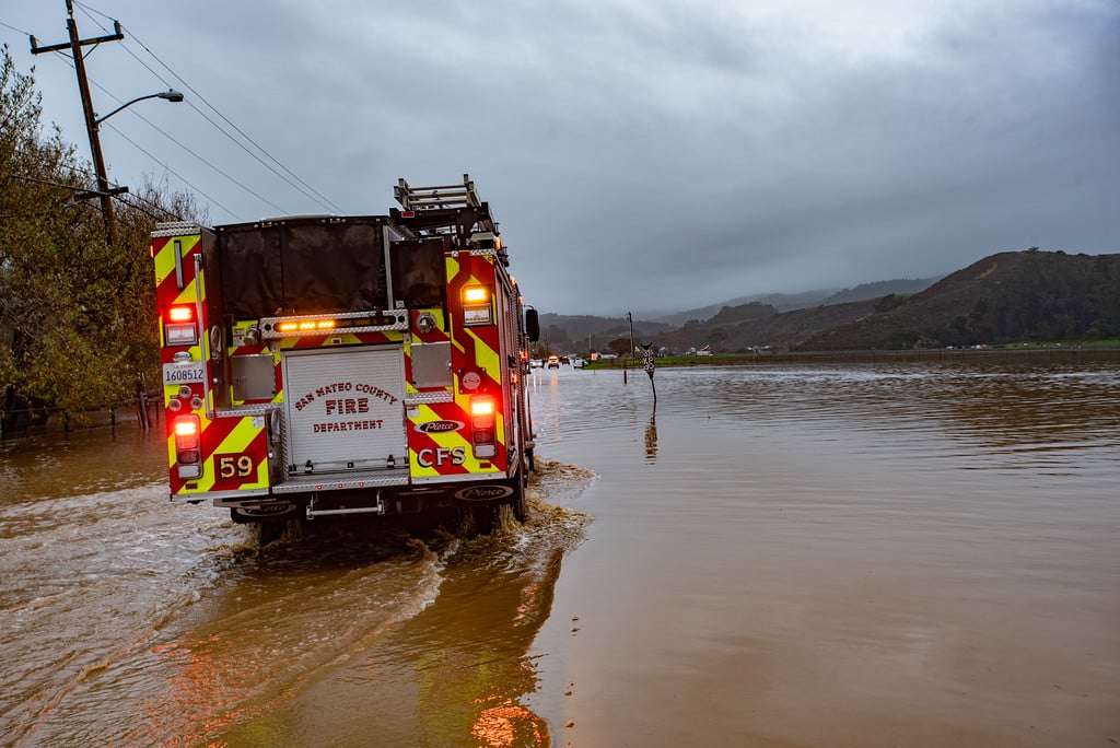 With the current station located in a flood zone, firefighters navigate the rising waters of Butano Creek to get to downtown Pescadero and points east.